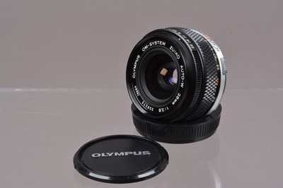 Lot 18 - An Olympus Zuiko 28mm f/2.8 OM Lens
