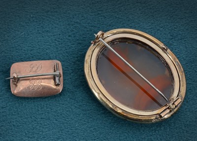 Lot 13 - A 19th century plaited hair panel brooch