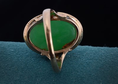 Lot 28 - An Edwardian 18ct gold jadeite jade cabochon dress ring