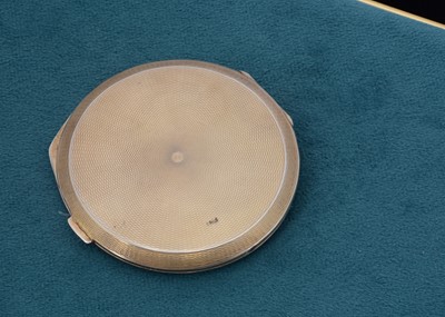 Lot 59 - An art deco silver and guilloche enamel circular compact