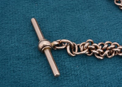 Lot 73 - A 9ct gold curb link watch chain with movable T bar