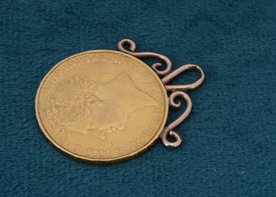 Lot 74 - A George IV mounted £2 coin