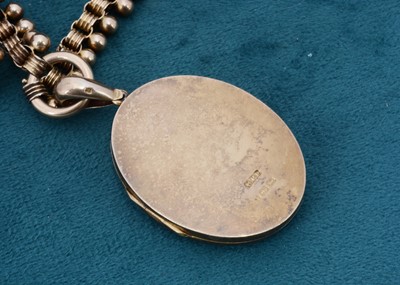 Lot 78 - A Victorian oval shaped hinged locket