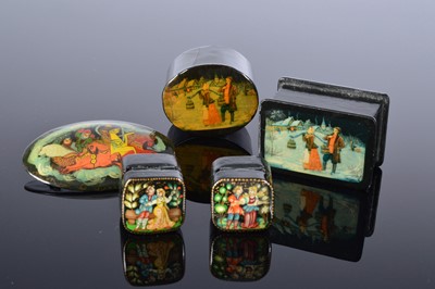 Lot 471 - Four small second half 20th century Russian lacquer and hand painted boxes and a brooch