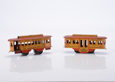 Lot 389 - A pair of tinplate 4-wheel floor-running Trams by Ferdinand Strauss (New York USA)