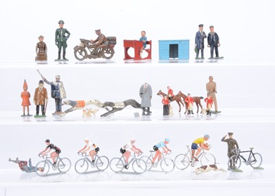 Lot 622 - Various lead and diecast civilian figures including Crescent and Britains comprising French-made cyclists (4)