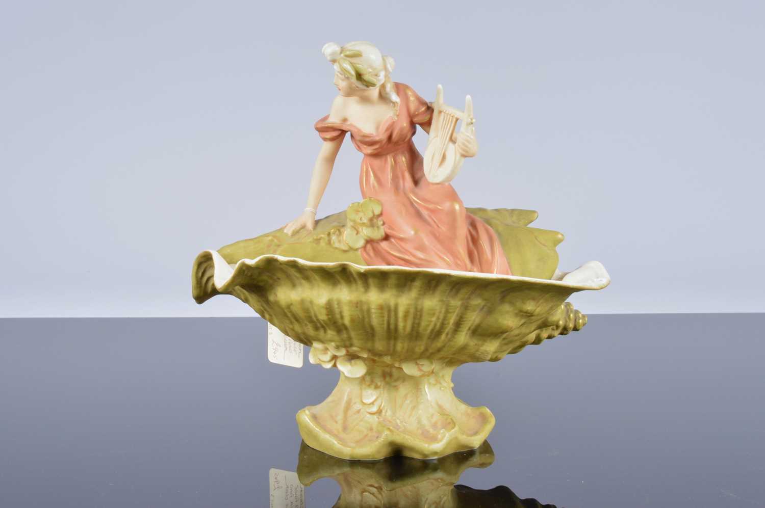 Lot 37 - A Royal Dux porcelain figural group