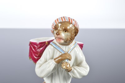 Lot 53 - A late 19th century Meissen porcelain monkey musician figure