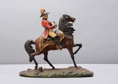 Lot 25 - A mid 19th century Thüringen papier-mâché figure of the Duke of Wellington riding Copenhagen