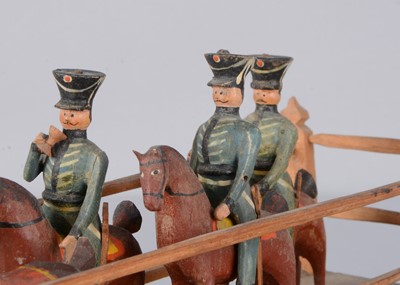 Lot 77 - A mid 19th century Erzgebirge cavalry crank toy