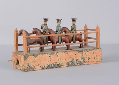 Lot 77 - A mid 19th century Erzgebirge cavalry crank toy