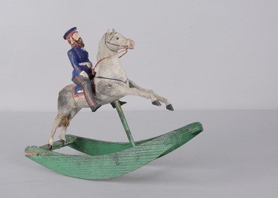Lot 79 - A mid 19th century Thüringen composition and wood German general mounted on rocker