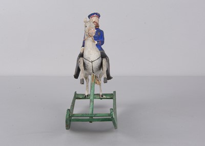 Lot 79 - A mid 19th century Thüringen composition and wood German general mounted on rocker