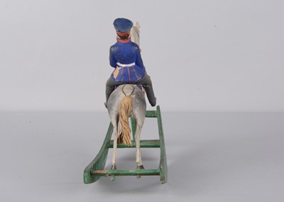 Lot 79 - A mid 19th century Thüringen composition and wood German general mounted on rocker
