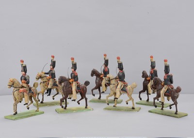 Lot 90 - Eight late 19th century German composition and wood French Napoleonic Cavalry