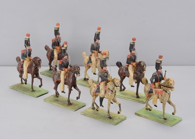 Lot 90 - Eight late 19th century German composition and wood French Napoleonic Cavalry