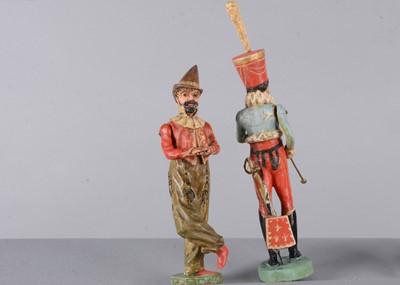 Lot 105 - Four mid 19th century wooden Hussar bandsmen