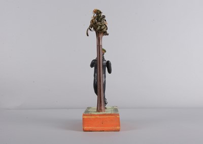 Lot 175 - An 1830s Sonneberg papier-mâché and wood hand-cranked mechanical toy of a student playing a flute