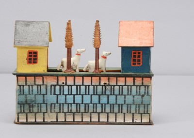 Lot 191 - A mid to late 19th century Erzgebirge small belt crank toy