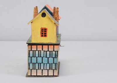Lot 191 - A mid to late 19th century Erzgebirge small belt crank toy