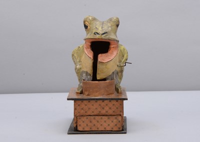 Lot 231 - A mid to late 19th century Thüringen frog eating fly crank handled ‘eater’