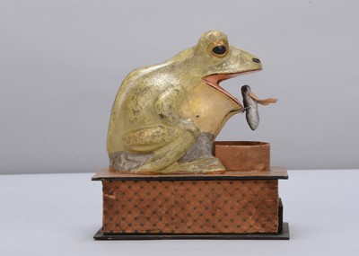 Lot 231 - A mid to late 19th century Thüringen frog eating fly crank handled ‘eater’