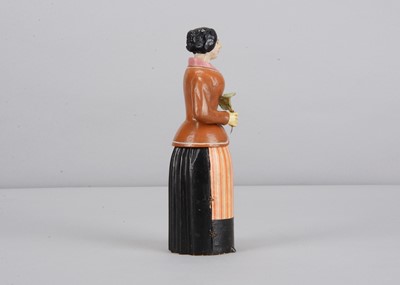 Lot 241 - An early to mid 19th century Oberammergau wooden figure of a woman with suitor hidden in her skirt