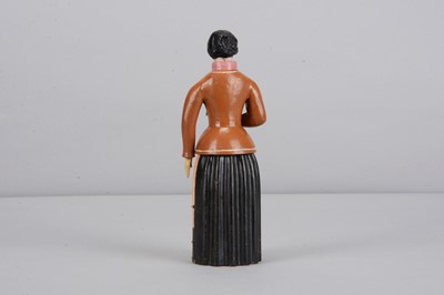 Lot 241 - An early to mid 19th century Oberammergau wooden figure of a woman with suitor hidden in her skirt