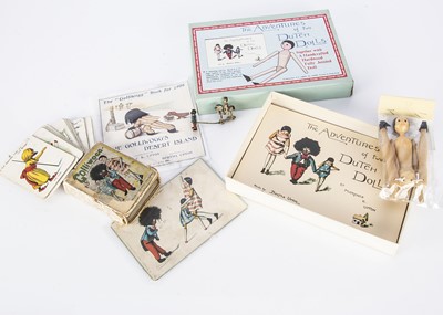 Lot 9 - A cold painted bronze Florence K Upton Golliwogg and Dutch Doll