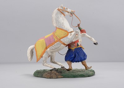 Lot 356 - An exhibition quality mid 19th century Thüringen composition  Turk with rearing horse