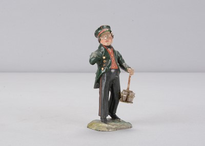 Lot 396 - A mid 19th century Rhöner carved wooden railway station drinking water boy