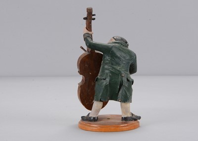 Lot 410 - A mid 19th century Sonneberg composition eight piece band
