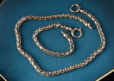 Lot 11 - A 9ct gold spiga linked necklace and matching bracelet