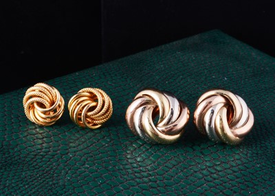 Lot 15 - A pair of 9ct gold three colour gold knot earrings with post backs