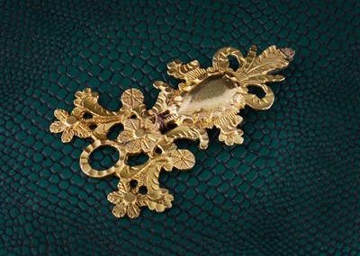 Lot 32 - An 18th Century yellow metal floral pierced pendant