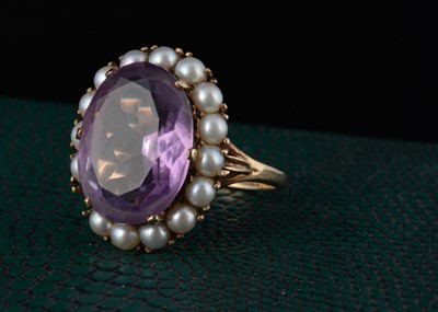 Lot 51 - A 9ct gold amethyst and seed pearl cluster ring