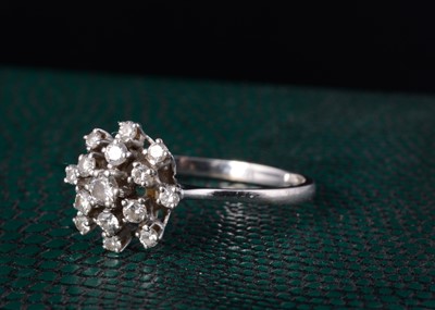Lot 55 - A white 18ct gold diamond cluster ring