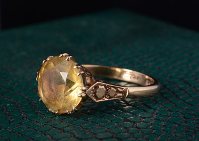 Lot 65 - A 9ct gold Citrine dress ring