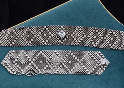 Lot 76 - A contemporary chrome plated American chocker necklace and matching bracelet