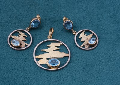Lot 104 - A silver gilt and topaz pendant and earring set