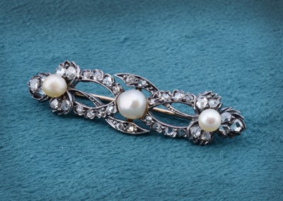 Lot 105 - A Victorian diamond and pearl bar brooch