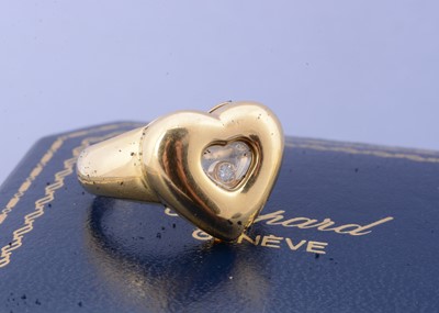 Lot 107 - A Chopard Happy Diamond 18ct gold dress ring