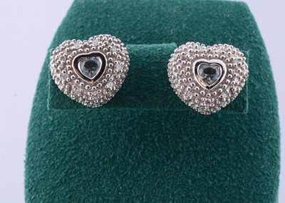 Lot 108 - A pair of 585 marked aquamarine and diamond heart shaped studs
