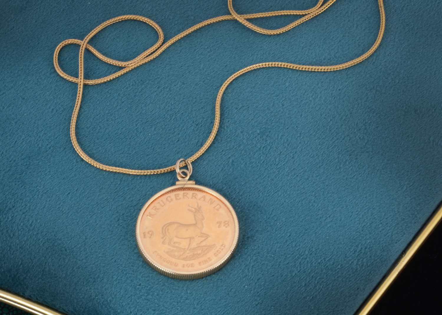 Lot 175 - A 1978 full Krugerrand in a yellow metal screw mount