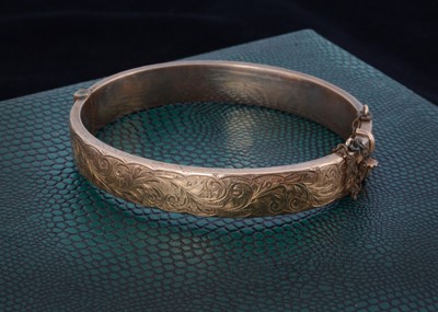 Lot 199 - A 9ct gold bangle