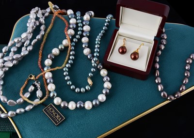 Lot 203 - A string of black 'Honora' cultured pearls