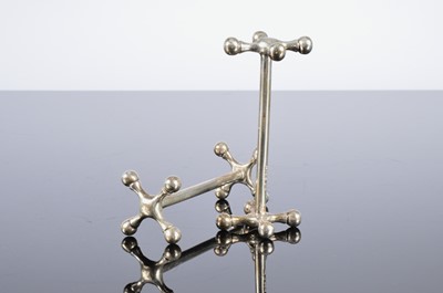 Lot 220 - A pair of George V silver knife rests by Walker & Hall