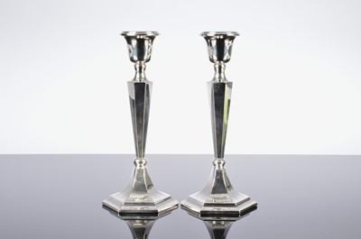Lot 236 - A pair of silver filled candlesticks by JD WD