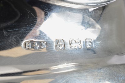 Lot 237 - A George V four piece silver tea set by H&N