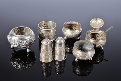 Lot 253 - A collection of six Indian cruet items and a napkin ring